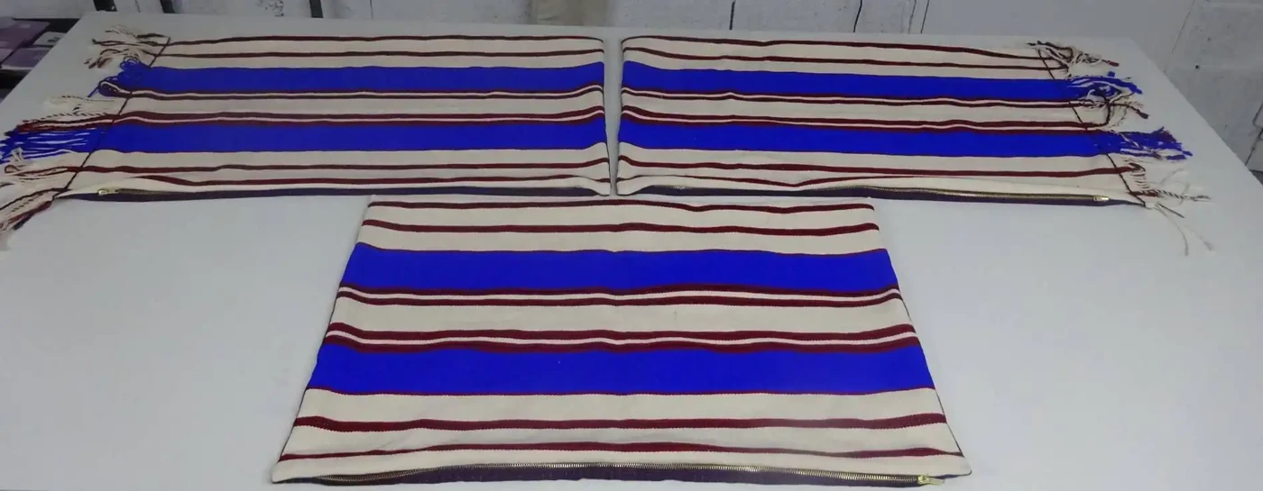 Housse rayé avec fermeture or et frange