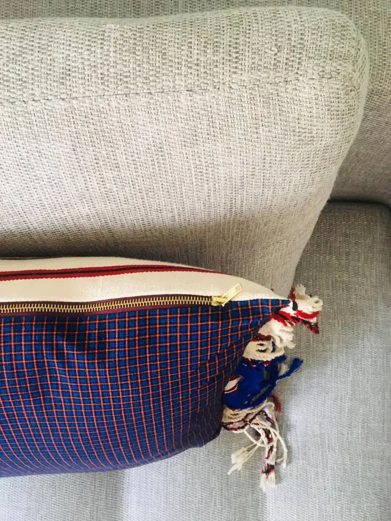 Housse rayé avec fermeture or et frange